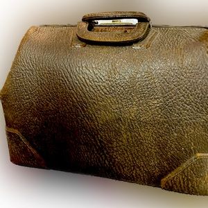 Antique turn of the century leather doctors bag.